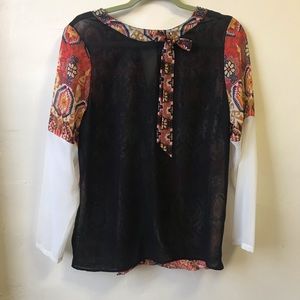 NWOT Unique long sleeve multi colored cross over back bow front blouse